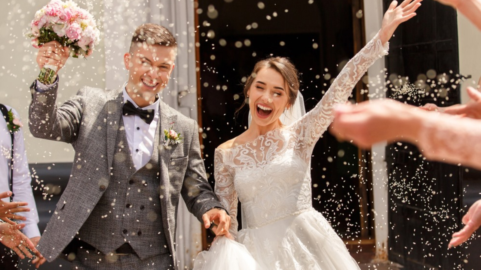 a wedding ceremony showing the bride and groom smiling and laughing