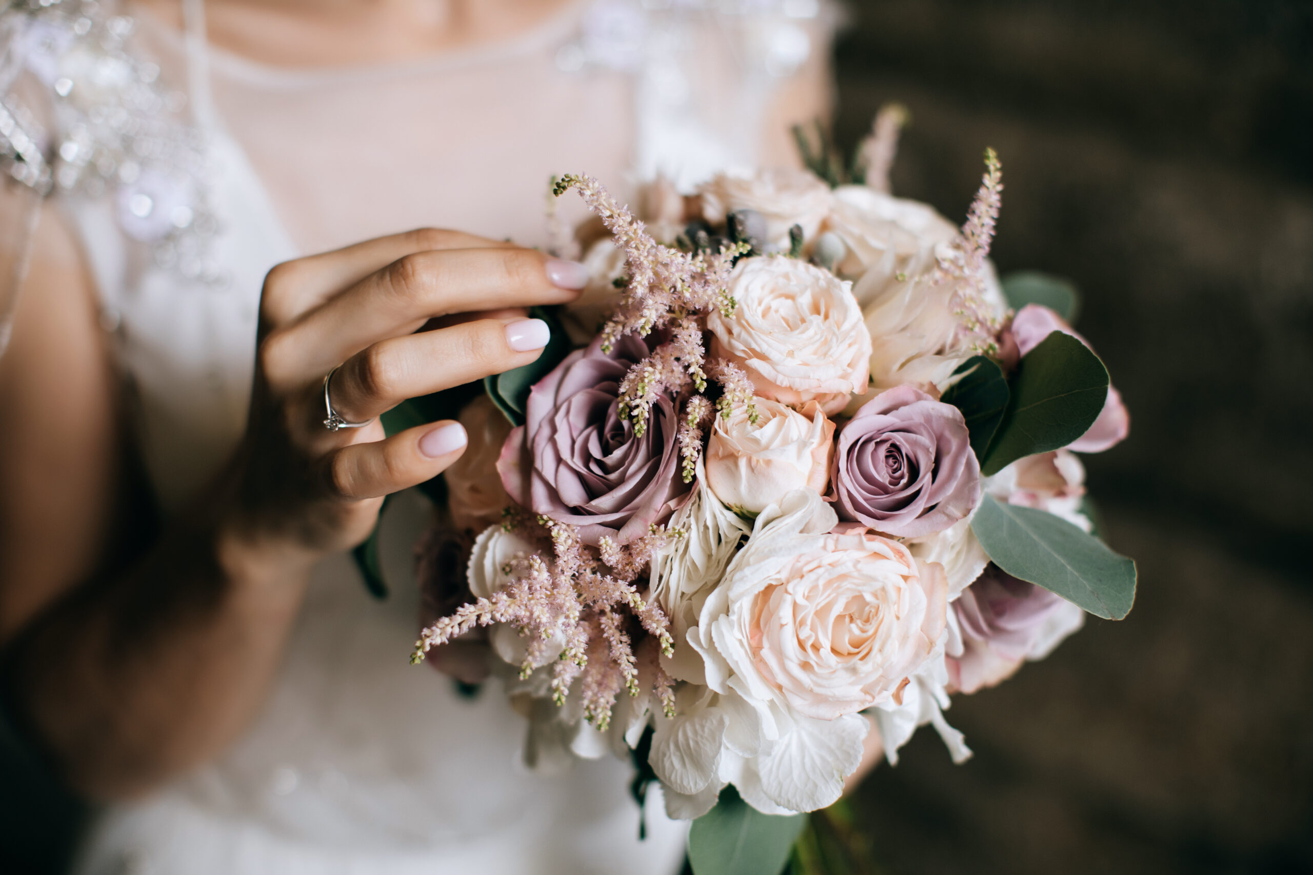 bride holding the wedding flower bouquet